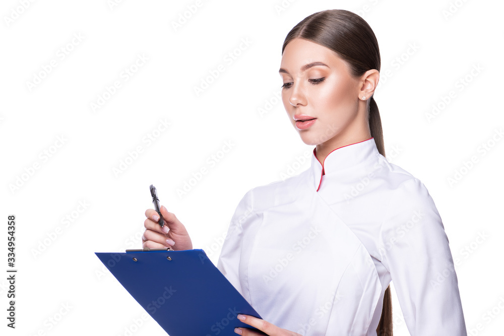 Beauty female doctor holding a clipboard. Woman with a serious face isolated on white background Beauty female doctor holding a clipboard. Woman with a serious face isolated on white background