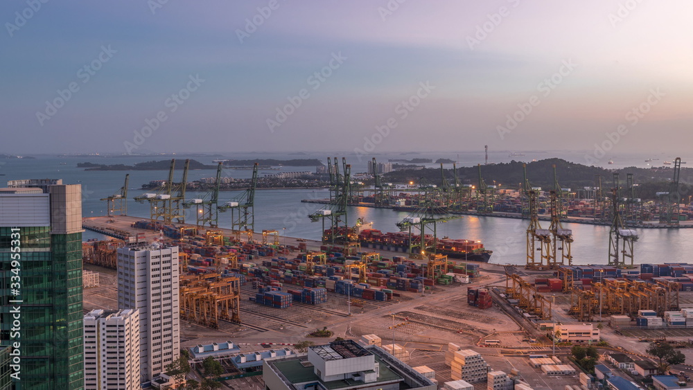 Commercial port of Singapore aerial day to night timelapse.