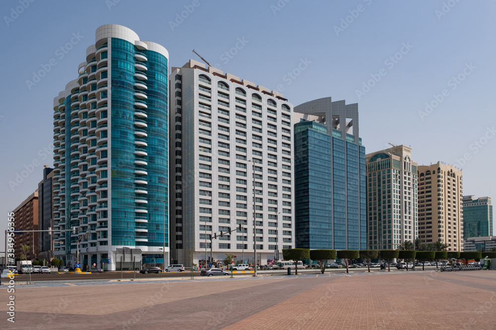 Abu Dhabi Corniche beach and walking area with landmark view of modern buildings, UAE. May 2019 Abu Dhabi Corniche beach and walking area with landmark view of modern buildings, UAE. May 2019