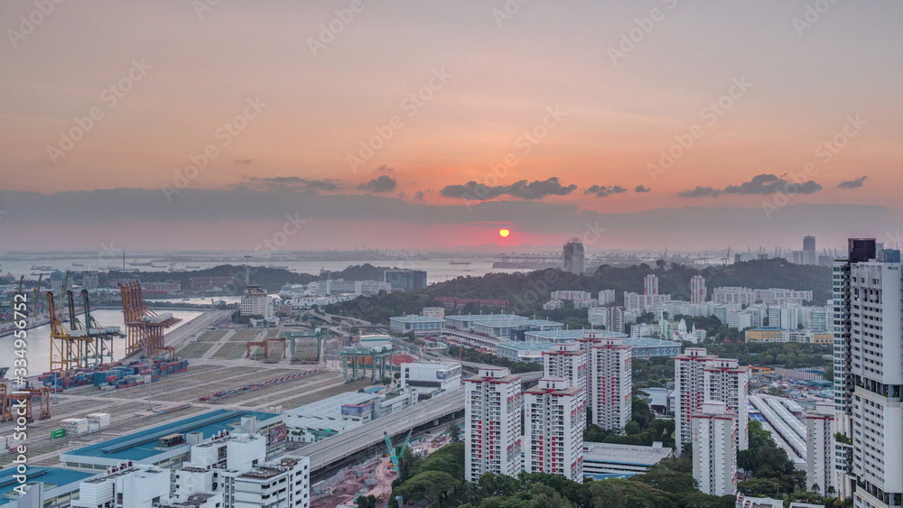 Sunset over commercial port of Singapore timelapse.