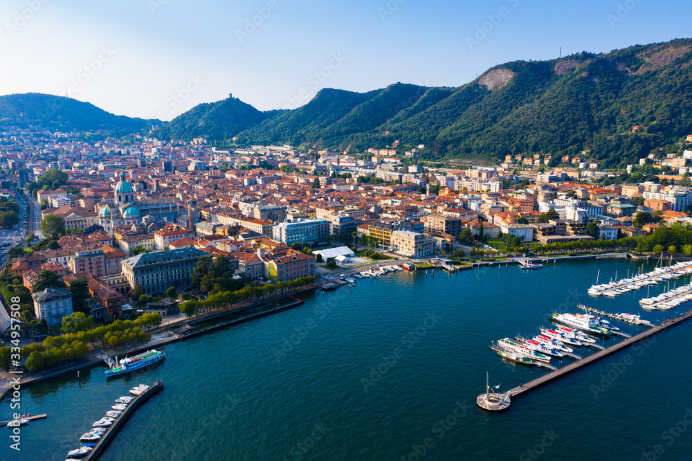 View of Como city on shore of lake