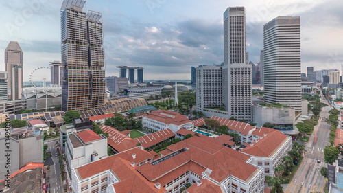 Evening panorama with Marina Bay area and skyscrapers city skyline aerial timelapse. © neiezhmakov