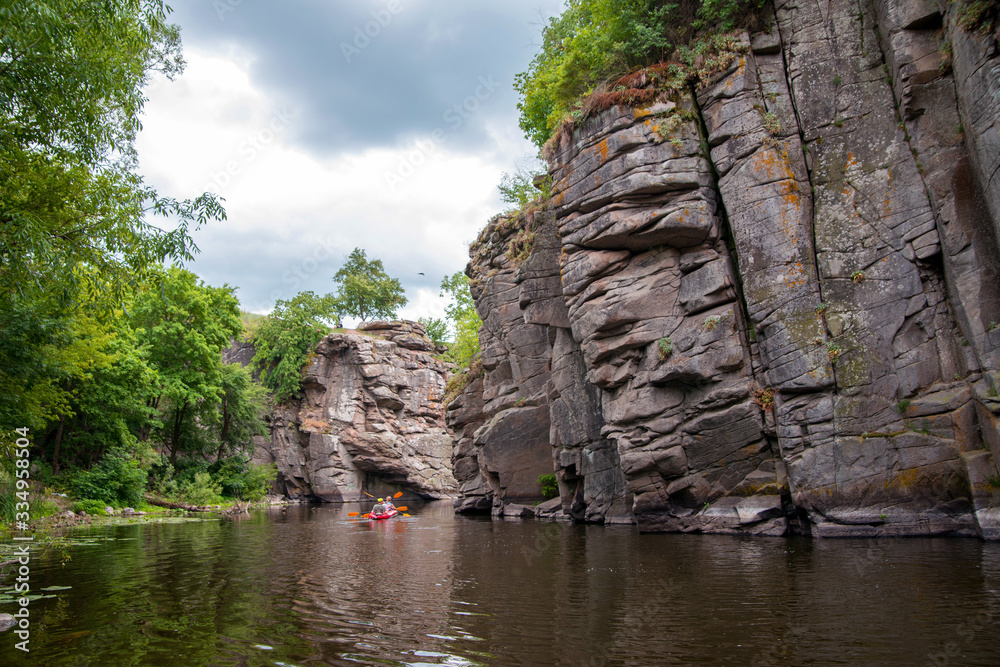 A stone quarry with a crystal clear river is great for canoes and boats.