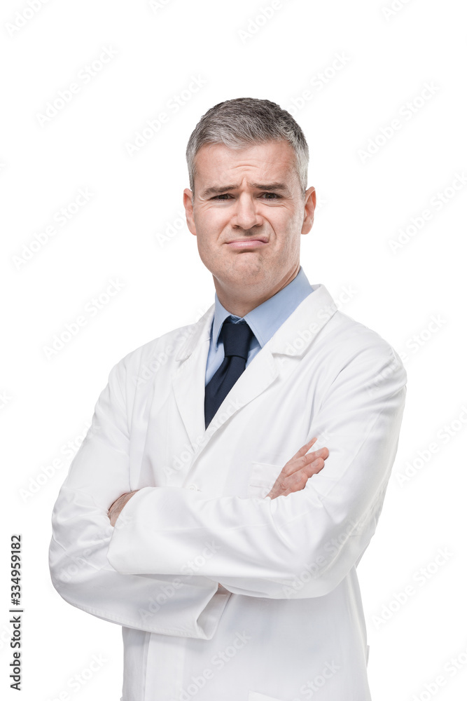 Upset, confused or disgusted doctor coat grimacing Upset, confused or disgusted doctor coat grimacing