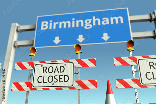 Roadblock near Birmingham city traffic sign. Coronavirus disease quarantine or lockdown in the United Kingdom conceptual 3D rendering © Alexey Novikov
