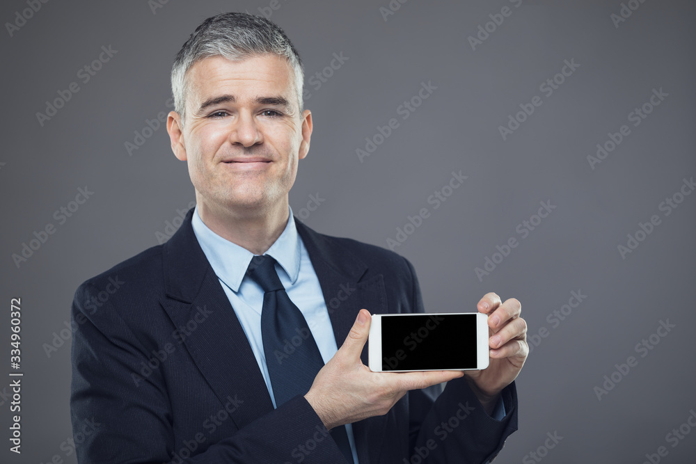 Smiling confident businessman or salesman Smiling confident businessman or salesman