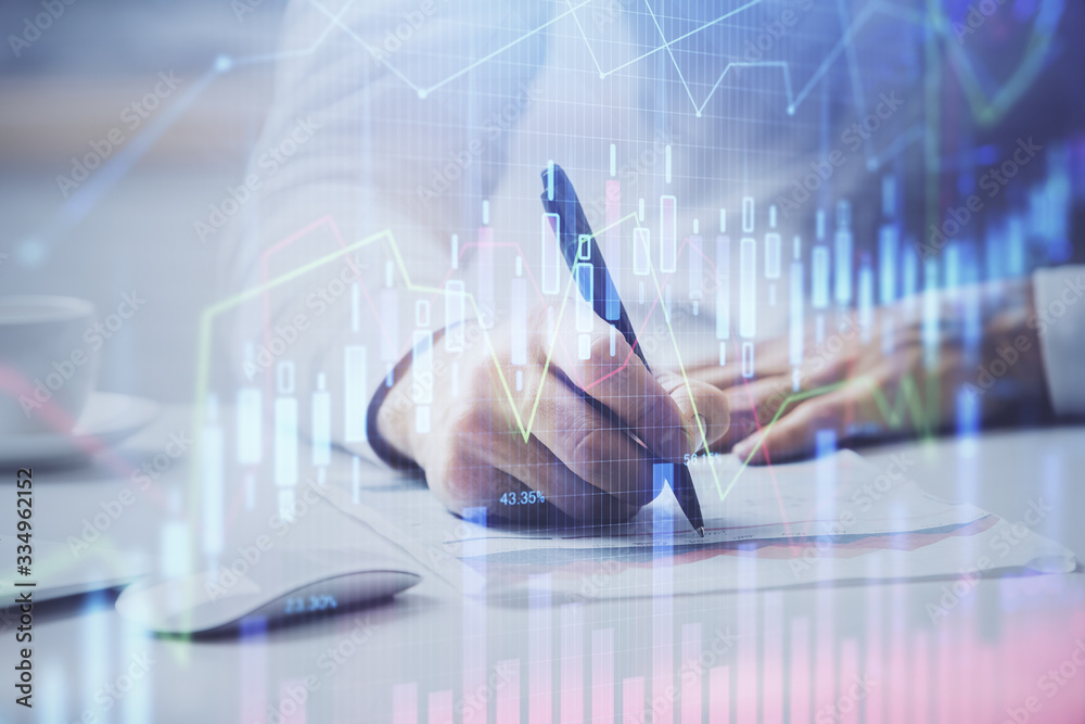 Financial trading chart multi exposure with man desktop background. Financial trading chart multi exposure with man desktop background.