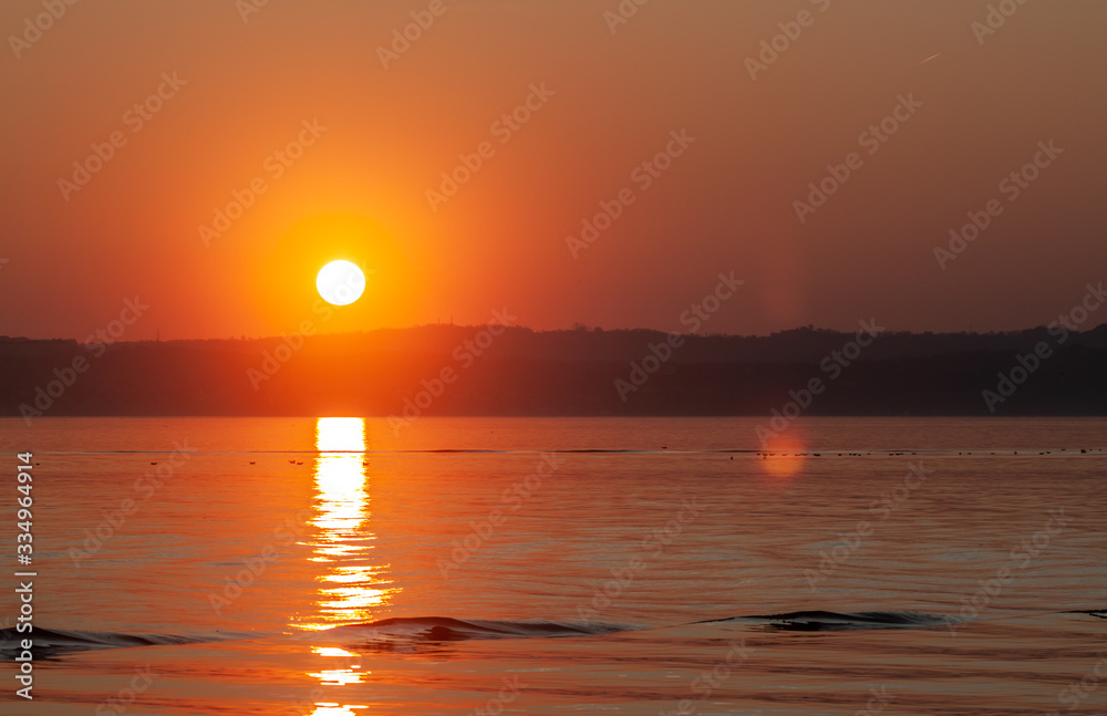 beautiful sunset over the lake sunlight reflection