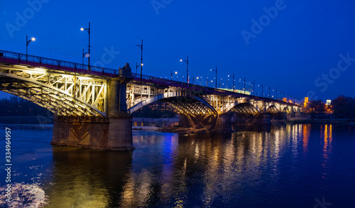 Warsaw, Poland - Panoramic evening view of the Most Slasko-Dabrowski bridge over the Vistula river downtown Warsaw