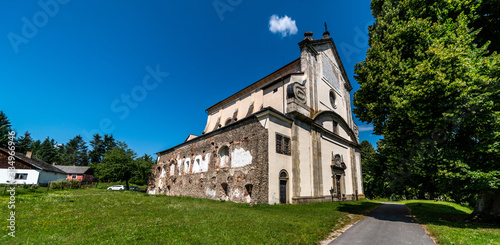 Romantic church and abbey in Klaster vilage near Nova Bystrice photo
