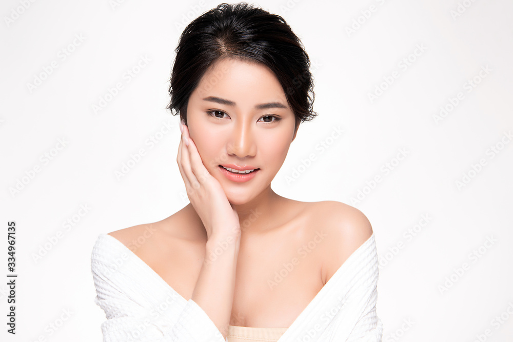 Beautiful Young Asian Woman with Clean Fresh Skin. Face care, Facial treatment, Cosmetology, beauty and healthy skin and cosmetic concept, woman beauty skin isolated on white background Beautiful Young Asian Woman with Clean Fresh Skin. Face care, Facial treatment, Cosmetology, beauty and healthy skin and cosmetic concept, woman beauty skin isolated on white background