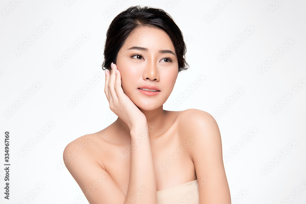 Beautiful Young Asian Woman with Clean Fresh Skin. Face care, Facial treatment, Cosmetology, beauty and healthy skin and cosmetic concept, woman beauty skin isolated on white background Beautiful Young Asian Woman with Clean Fresh Skin. Face care, Facial treatment, Cosmetology, beauty and healthy skin and cosmetic concept, woman beauty skin isolated on white background