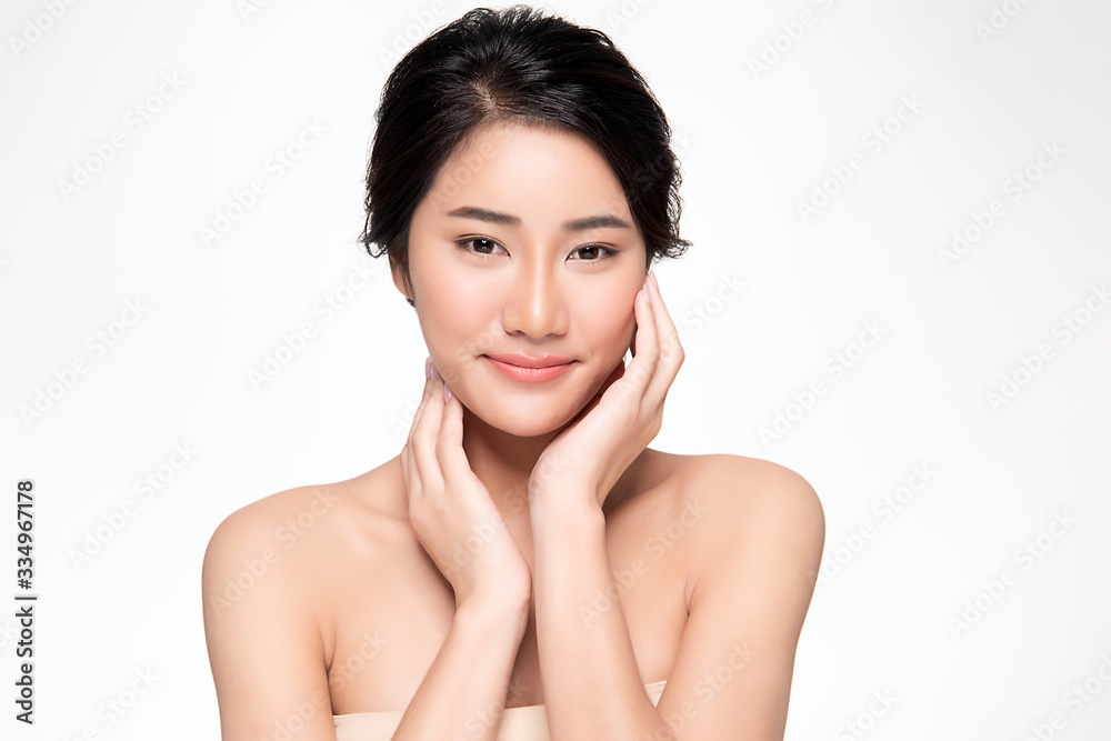 Beautiful Young Asian Woman with Clean Fresh Skin. Face care, Facial treatment, Cosmetology, beauty and healthy skin and cosmetic concept, woman beauty skin isolated on white background Beautiful Young Asian Woman with Clean Fresh Skin. Face care, Facial treatment, Cosmetology, beauty and healthy skin and cosmetic concept, woman beauty skin isolated on white background