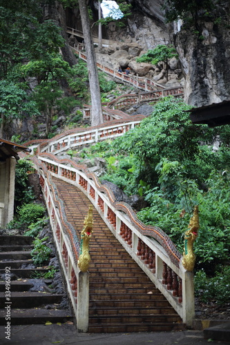 staircase climbing in a cave, Wat Tham Khao Chakan, Sa Kaeo, Thailand.