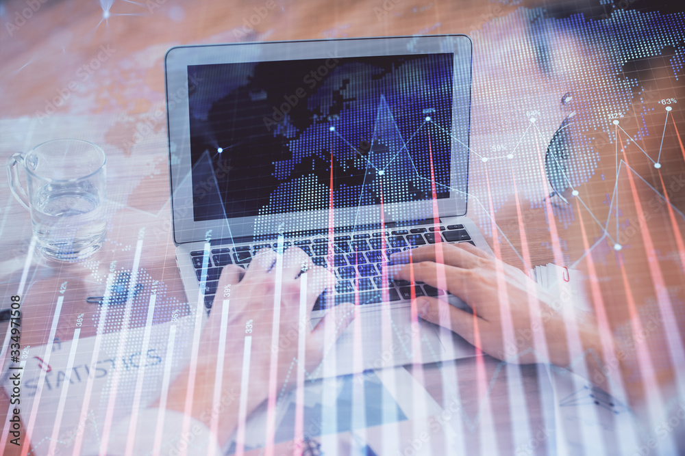 Multi exposure of market chart with man working on computer on background. Concept of financial analysis. Multi exposure of market chart with man working on computer on background. Concept of financial analysis.