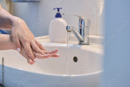 Woman washing hands