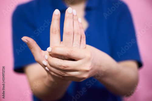 Woman with handpain. Carpal tunnel syndrome