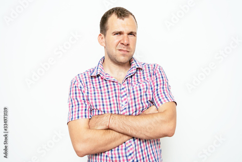 Portrait of a man arms folded