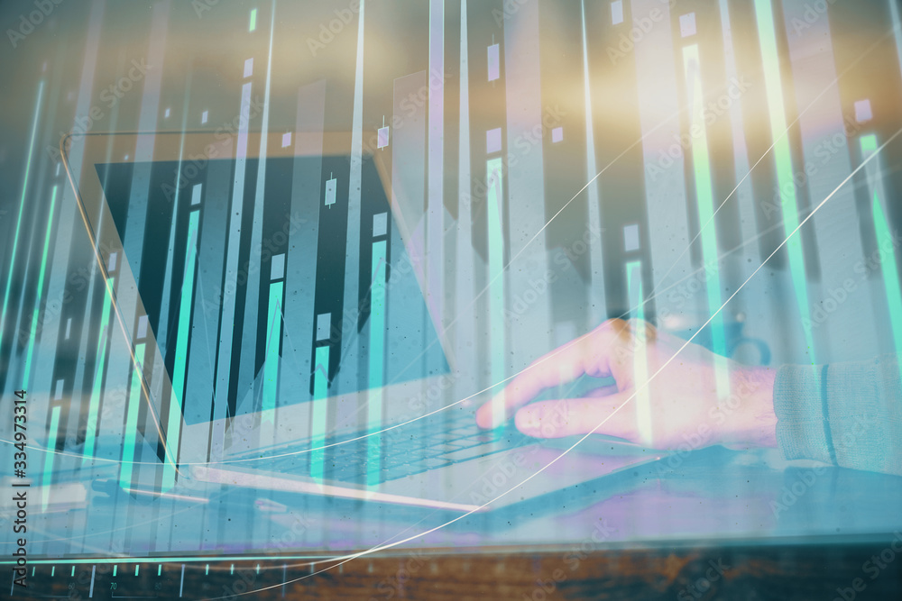 Double exposure of stock market graph with man working on laptop on background. Concept of financial analysis. Double exposure of stock market graph with man working on laptop on background. Concept of financial analysis.