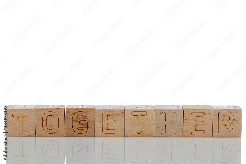 Naklejka premium Wooden cubes with letters together on a white background