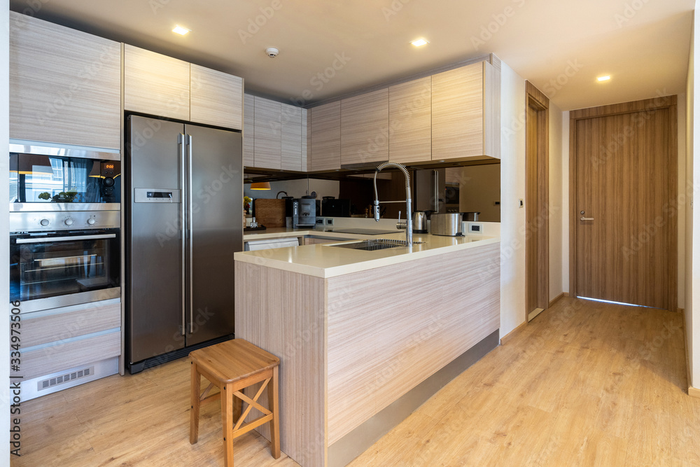 Interior design in villa, house, home, condo and apartment feature island counter, refrigerator and kitchen appliance