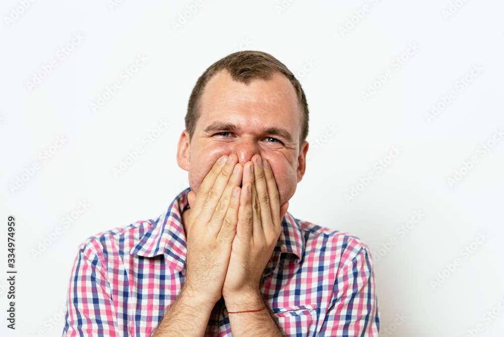 man laughs and covers her mouth man laughs and covers her mouth