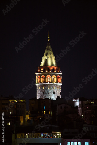Galata Kulesi Tower at night in Istanbul, Turkey. Ancient Turkish famous landmark in Beyoglu district, European side of the city. Architecture of the Constantinople.A historical place made by Genoese