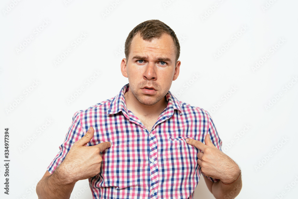 Male hand forefinger pointing to himself on the chest. Gesture. who am i. On a gray background Male hand forefinger pointing to himself on the chest. Gesture. who am i. On a gray background