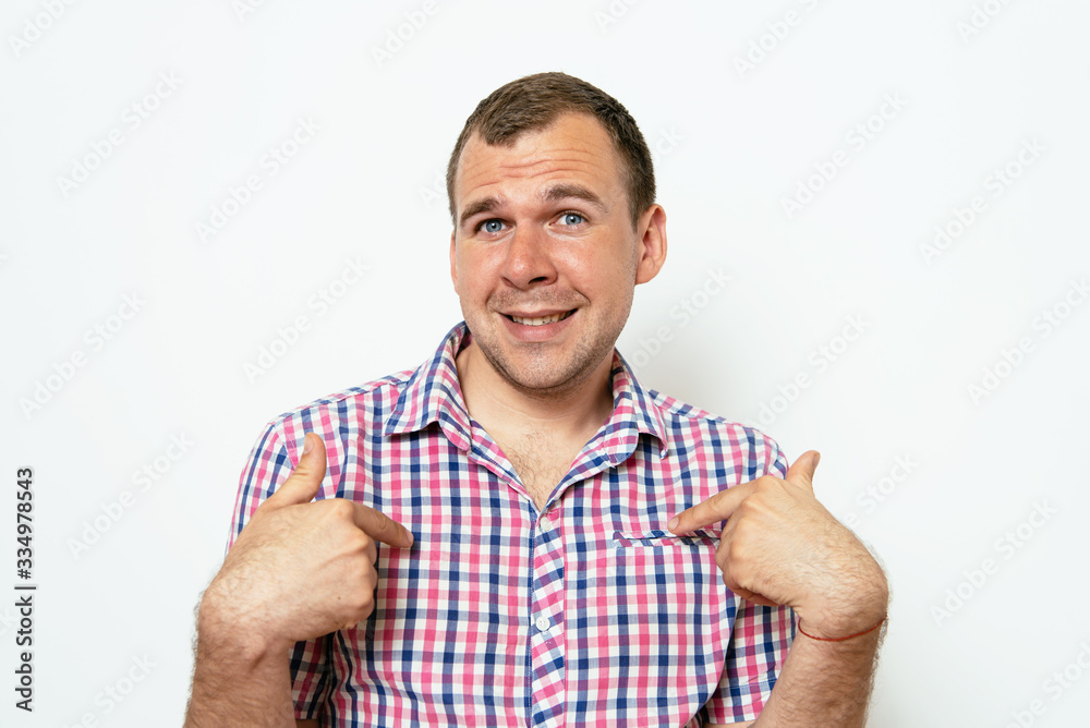 Male hand forefinger pointing to himself on the chest. Gesture. who am i. On a gray background Male hand forefinger pointing to himself on the chest. Gesture. who am i. On a gray background
