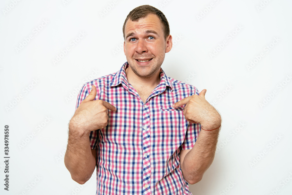 Male hand forefinger pointing to himself on the chest. Gesture. who am i. On a gray background Male hand forefinger pointing to himself on the chest. Gesture. who am i. On a gray background