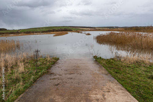 Elevated water level of Bower s lake during the spring floods caused  that path disappearead under the water