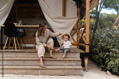 mother plays with baby 