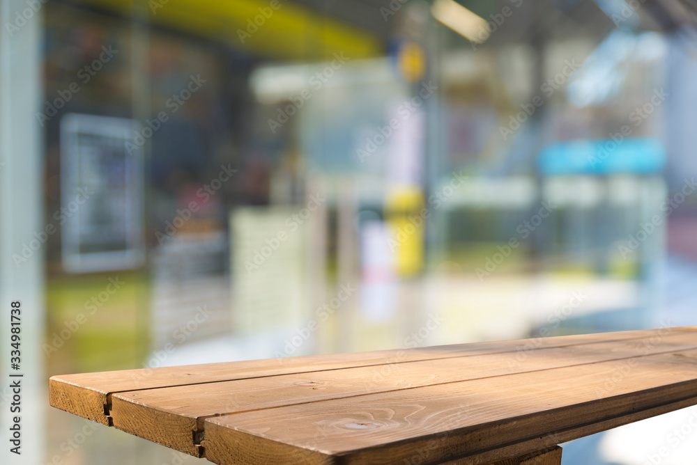 Empty tropical wood table and blurred garden cafe light background. product display template.Business presentation Empty tropical wood table and blurred garden cafe light background. product display template.Business presentation