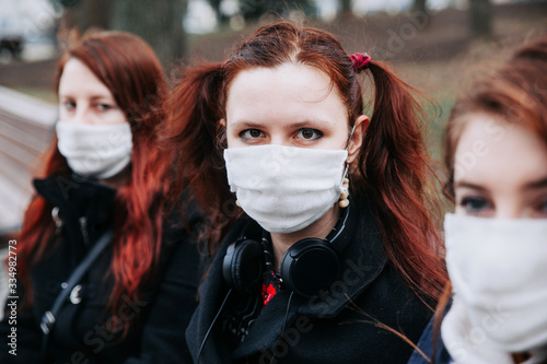 Women wearing a face masks against pollution or disease
