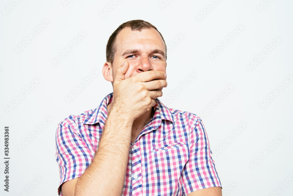 man laughs and covers her mouth man laughs and covers her mouth