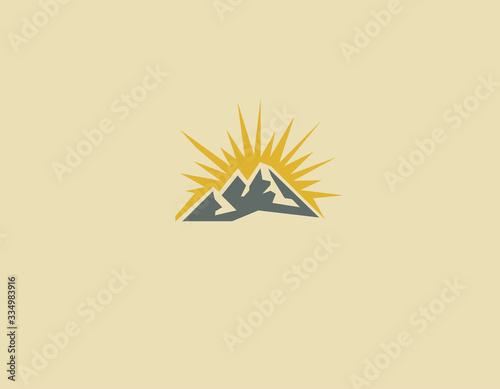 Creative abstract logo mountain icon with sun and rays for your company