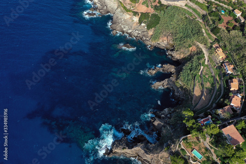 The delightful island of Mallorca, Spain, the line of the surf, photograph from the air. The rocky shore, the view from the top.