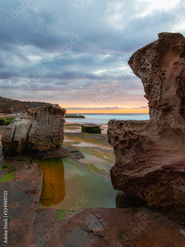 Two big rocks on the coastline of Turimetta Beach, Sydney.