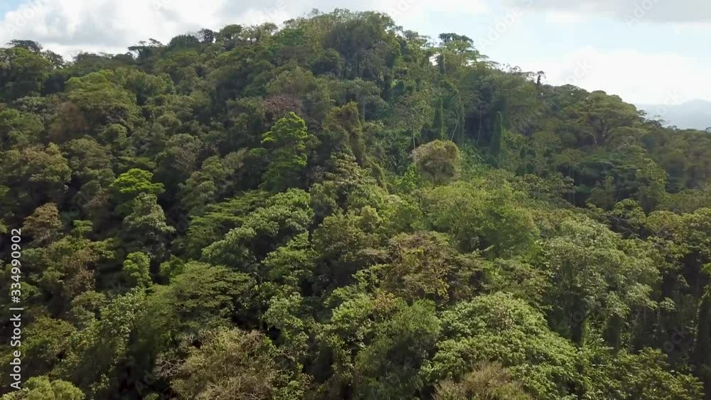 Arenal vulcanic area filmed by drone, rain forest and clouds and road Arenal vulcanic area filmed by drone, rain forest and clouds and road