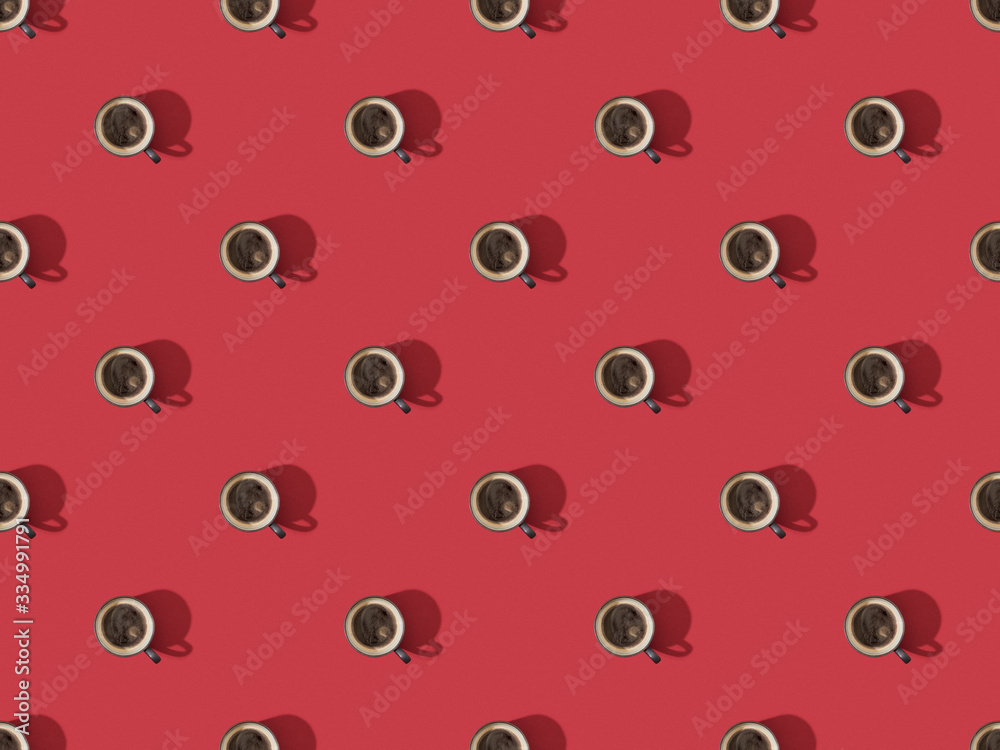 top view of cups of fresh coffee on red, seamless background pattern top view of cups of fresh coffee on red, seamless background pattern