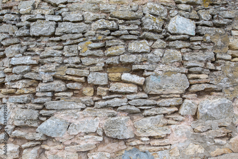 old masonry, old wall of rubble stone old masonry, old wall of rubble stone