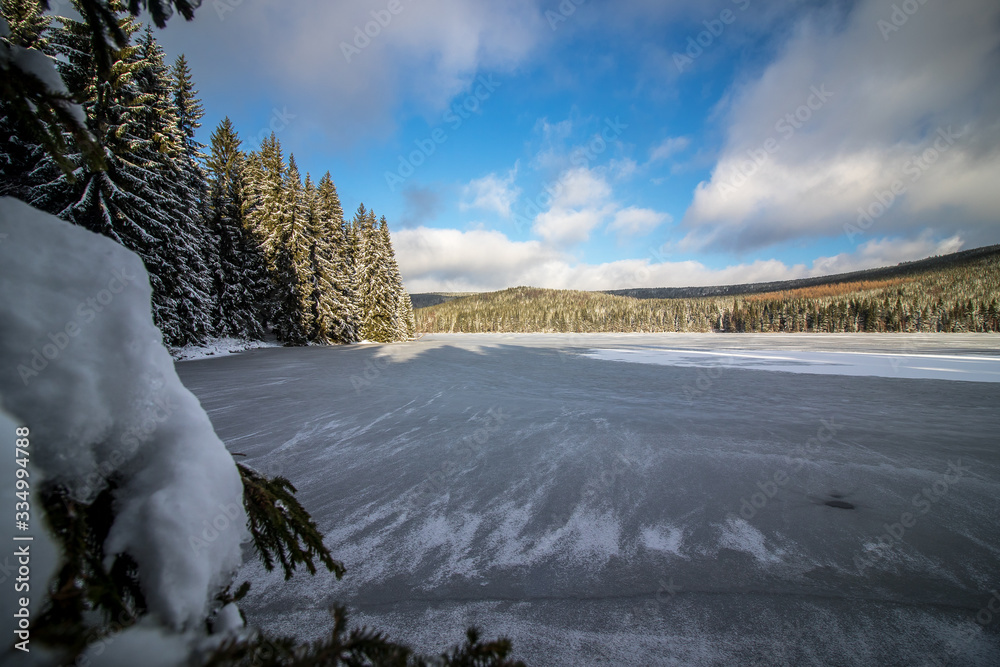 Winter scenery of water reservoir Sous located in Jizera Mountains