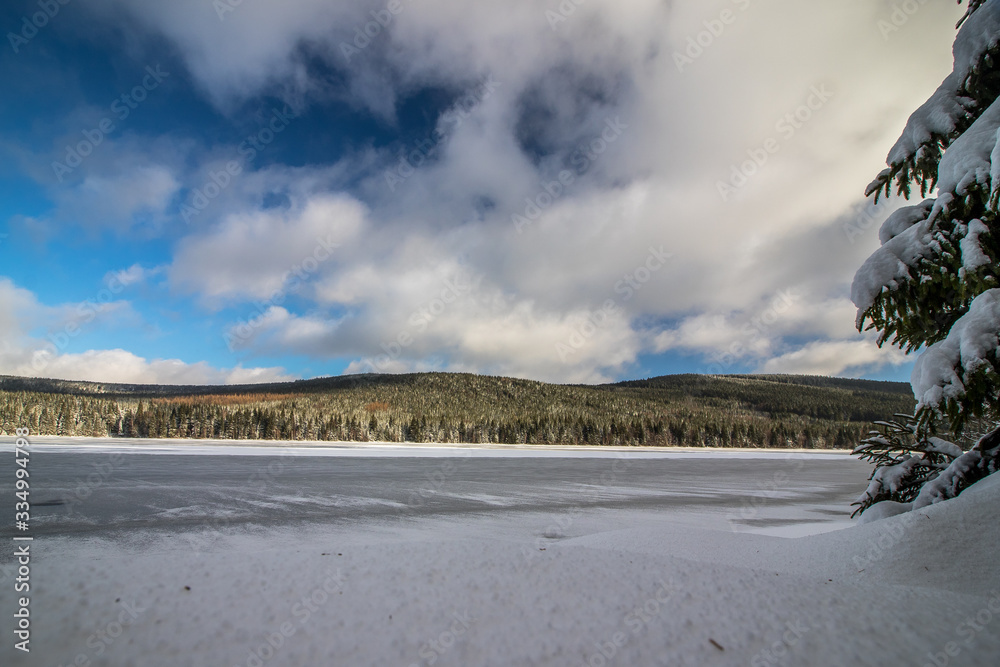 Winter scenery of water reservoir Sous located in Jizera Mountains