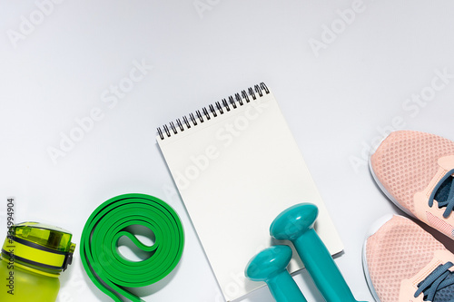 Sport and workout equipment on white background with copy space for your text. Healthy lifestyle concept.