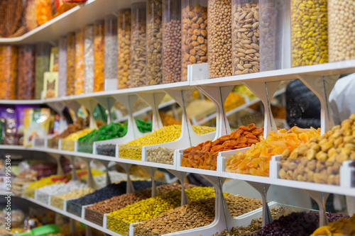 Market stall with various dried fruits and nuts