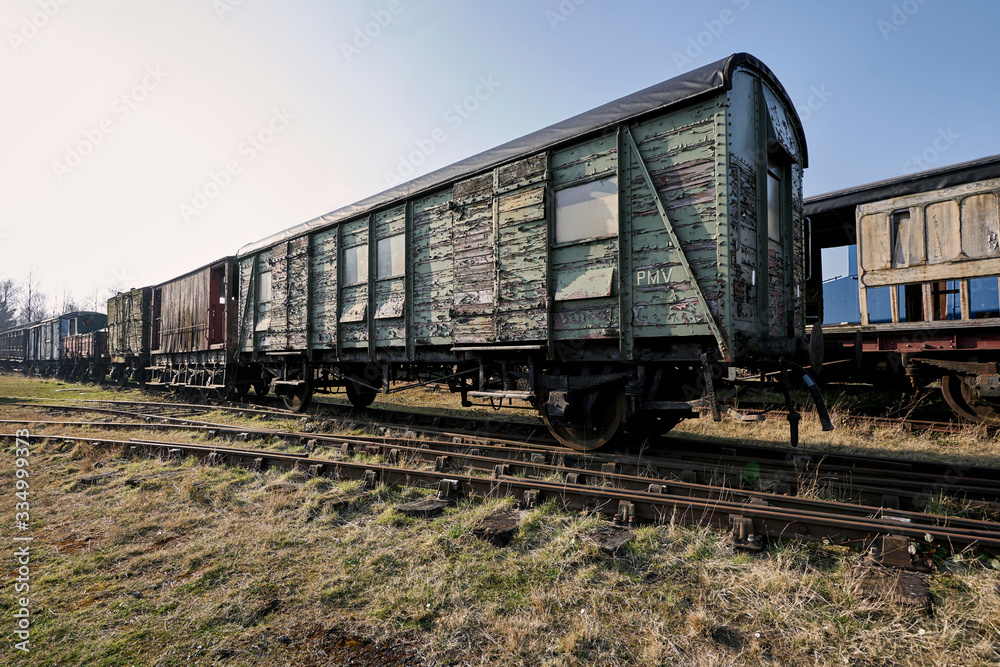 Abandoned train depot with various trains and carriages in different states of decay. Abandoned train depot with various trains and carriages in different states of decay.
