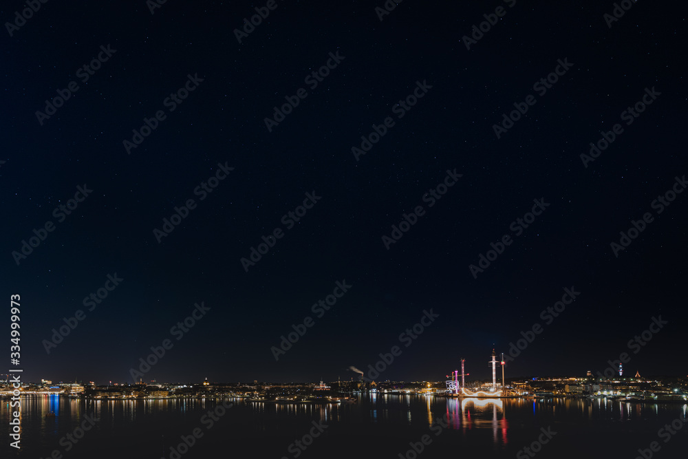 starscape over stockholm city at night