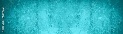 Abstract dark aquamarine turquoise concrete stone paper texture background banner, trend color 2020 photo