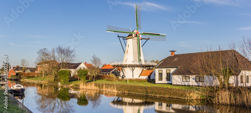 Cuadro en lienzo Panorama of the historic windmill at the Damsterdiep river in Ten Boer, Netherla