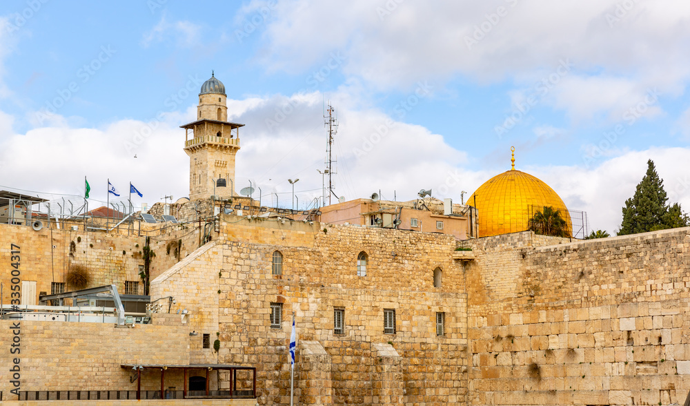 view of the Temple Mount in Jerusalem, including the Western Wall and the golden Dome of the Rock.